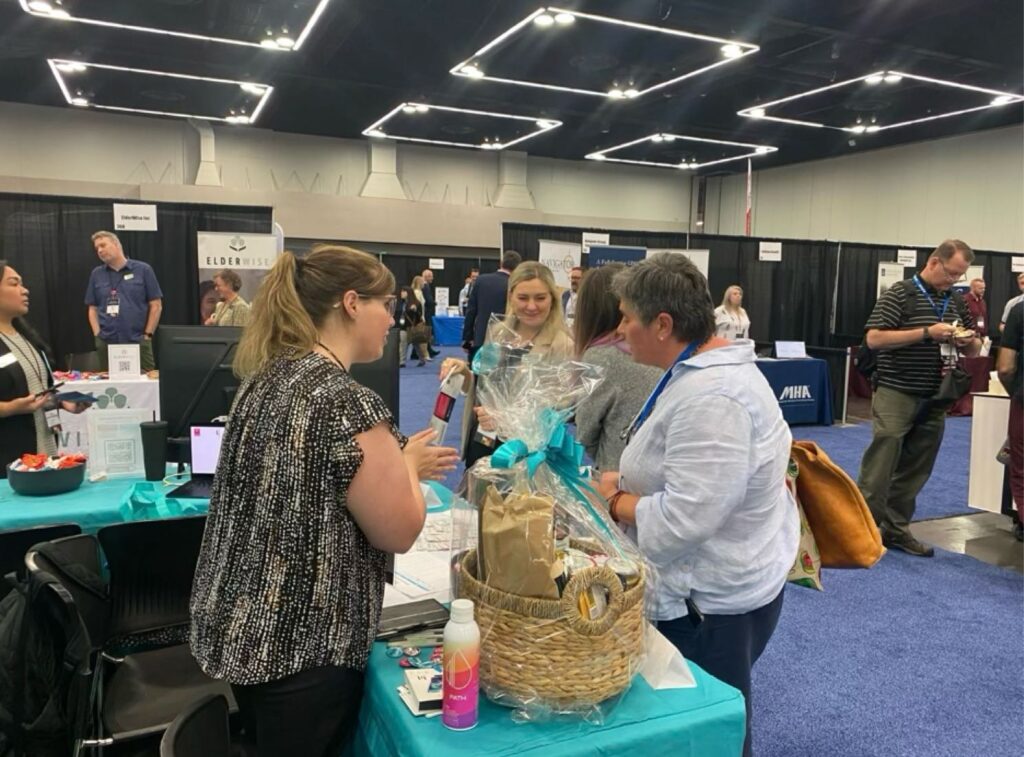 The NurseLearn mentor team mingles with future nurse and administrator learners at NurseLearn’s booth during the Oregon Health Care Association’s Annual Convention.